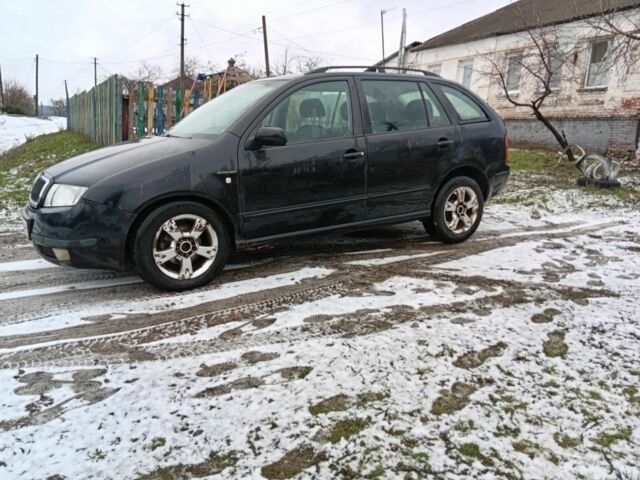 Черный Шкода Фабия, объемом двигателя 1.4 л и пробегом 205 тыс. км за 2958 $, фото 1 на Automoto.ua