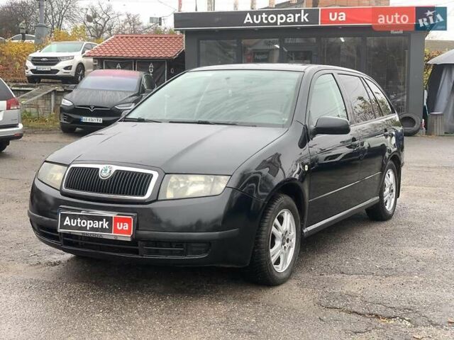 Черный Шкода Фабия, объемом двигателя 1.4 л и пробегом 308 тыс. км за 3390 $, фото 1 на Automoto.ua