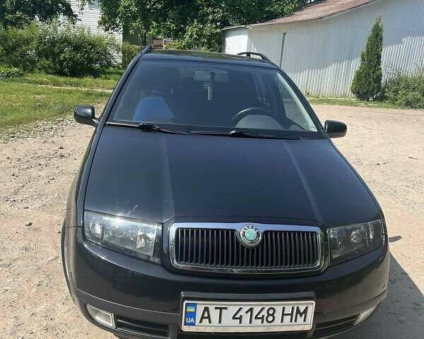 Черный Шкода Фабия, объемом двигателя 1.39 л и пробегом 226 тыс. км за 4600 $, фото 1 на Automoto.ua