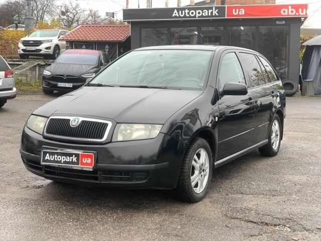 Черный Шкода Фабия, объемом двигателя 1.4 л и пробегом 308 тыс. км за 3390 $, фото 1 на Automoto.ua
