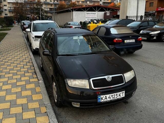 Черный Шкода Фабия, объемом двигателя 1.39 л и пробегом 175 тыс. км за 3900 $, фото 1 на Automoto.ua