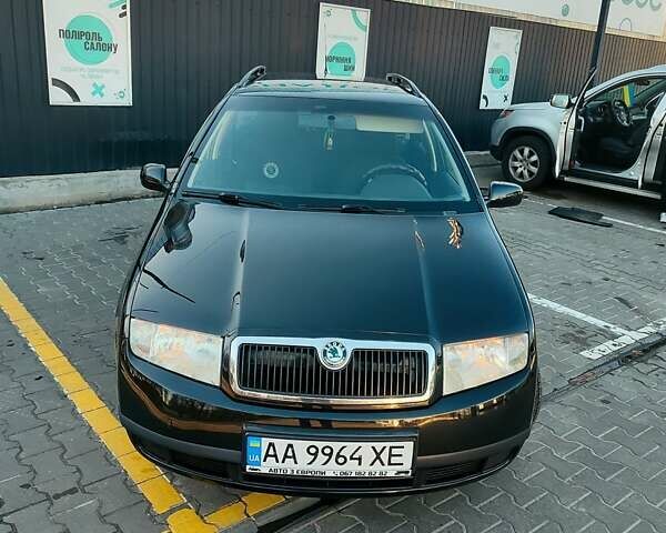 Черный Шкода Фабия, объемом двигателя 1.2 л и пробегом 227 тыс. км за 3200 $, фото 1 на Automoto.ua