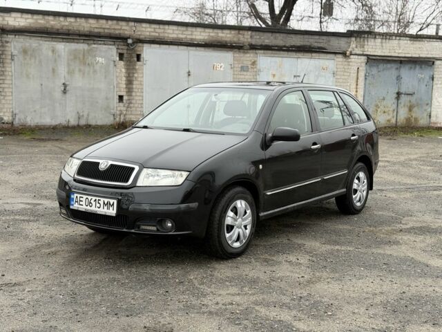 Черный Шкода Фабия, объемом двигателя 1.4 л и пробегом 233 тыс. км за 3800 $, фото 1 на Automoto.ua