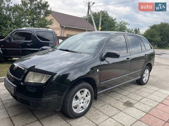 Чорний Шкода Фабія, об'ємом двигуна 1.39 л та пробігом 186 тис. км за 4100 $, фото 1 на Automoto.ua