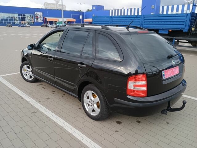 Черный Шкода Фабия, объемом двигателя 1.4 л и пробегом 179 тыс. км за 4950 $, фото 1 на Automoto.ua