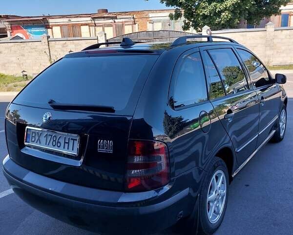 Черный Шкода Фабия, объемом двигателя 1.39 л и пробегом 240 тыс. км за 5300 $, фото 1 на Automoto.ua