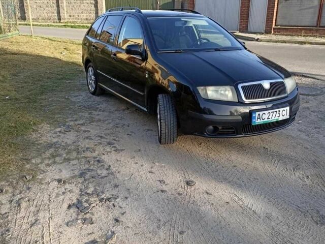 Черный Шкода Фабия, объемом двигателя 1.4 л и пробегом 280 тыс. км за 3990 $, фото 1 на Automoto.ua