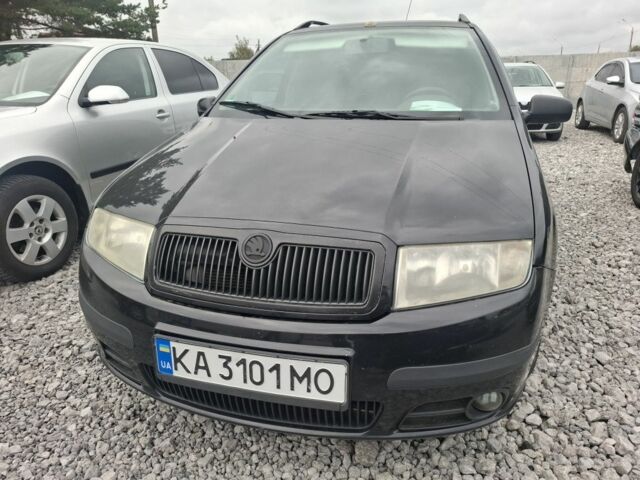 Черный Шкода Фабия, объемом двигателя 1.4 л и пробегом 229 тыс. км за 4350 $, фото 1 на Automoto.ua