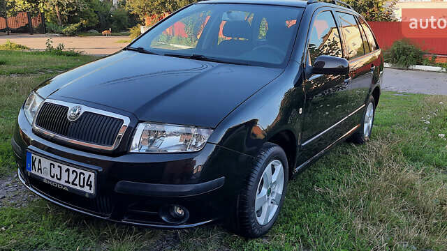 Черный Шкода Фабия, объемом двигателя 1.39 л и пробегом 167 тыс. км за 4999 $, фото 1 на Automoto.ua