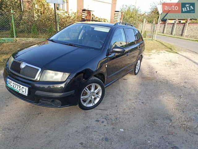 Черный Шкода Фабия, объемом двигателя 1.39 л и пробегом 237 тыс. км за 4100 $, фото 1 на Automoto.ua