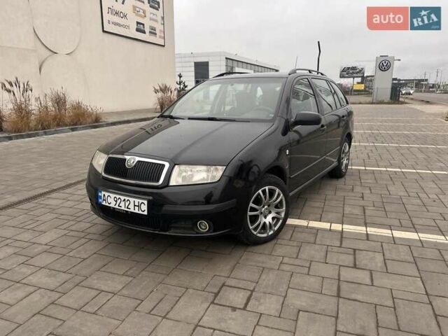 Черный Шкода Фабия, объемом двигателя 1.42 л и пробегом 262 тыс. км за 4200 $, фото 1 на Automoto.ua