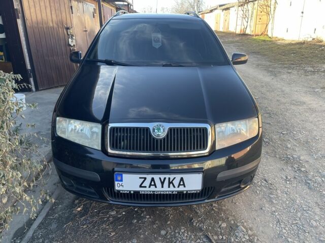 Черный Шкода Фабия, объемом двигателя 1.4 л и пробегом 328 тыс. км за 4500 $, фото 1 на Automoto.ua