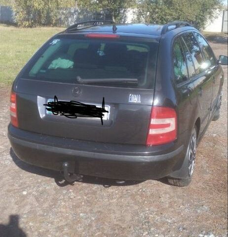 Черный Шкода Фабия, объемом двигателя 1.4 л и пробегом 208 тыс. км за 4000 $, фото 1 на Automoto.ua