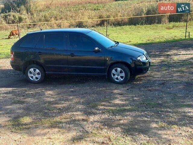Черный Шкода Фабия, объемом двигателя 1.2 л и пробегом 172 тыс. км за 4700 $, фото 1 на Automoto.ua