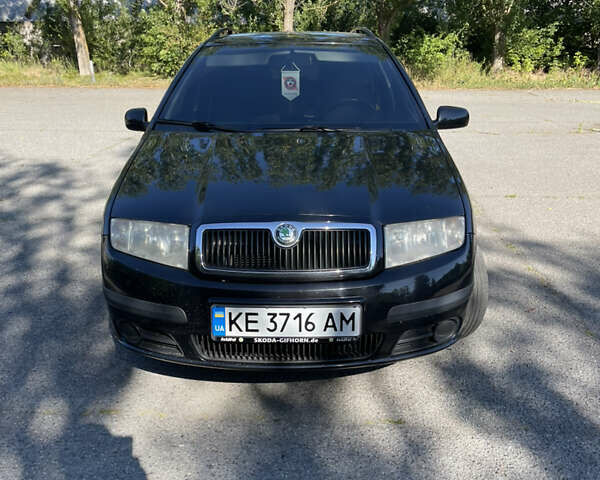 Черный Шкода Фабия, объемом двигателя 1.4 л и пробегом 328 тыс. км за 4500 $, фото 1 на Automoto.ua