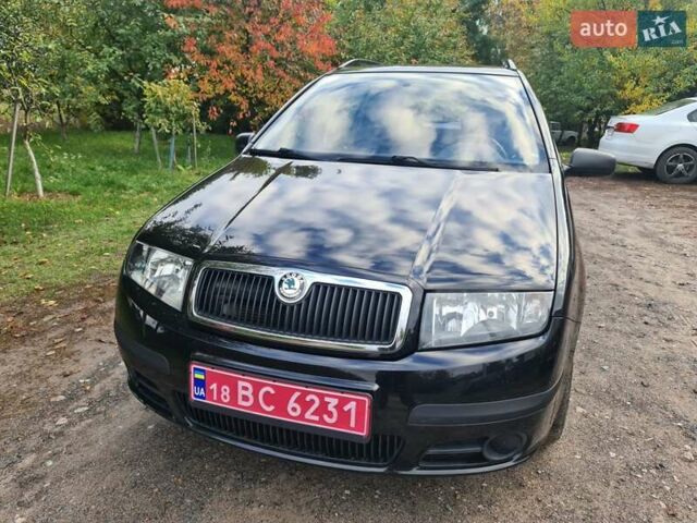 Черный Шкода Фабия, объемом двигателя 1.4 л и пробегом 196 тыс. км за 4699 $, фото 1 на Automoto.ua
