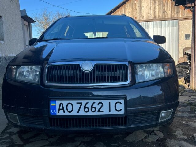 Черный Шкода Фабия, объемом двигателя 1.4 л и пробегом 470 тыс. км за 3500 $, фото 1 на Automoto.ua