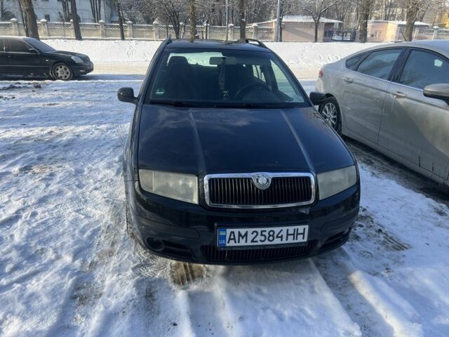 Черный Шкода Фабия, объемом двигателя 1.4 л и пробегом 201 тыс. км за 4200 $, фото 1 на Automoto.ua