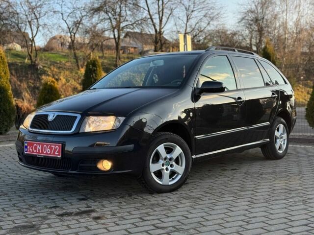 Чорний Шкода Фабія, об'ємом двигуна 1.4 л та пробігом 206 тис. км за 4399 $, фото 1 на Automoto.ua