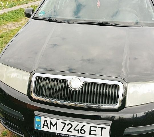 Черный Шкода Фабия, объемом двигателя 1.39 л и пробегом 273 тыс. км за 3900 $, фото 1 на Automoto.ua