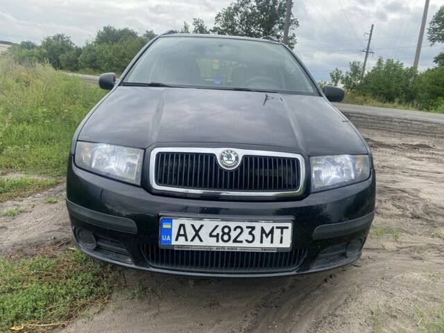 Черный Шкода Фабия, объемом двигателя 1.4 л и пробегом 213 тыс. км за 4200 $, фото 1 на Automoto.ua