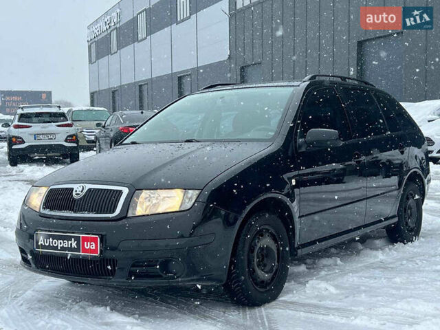 Черный Шкода Фабия, объемом двигателя 1.4 л и пробегом 276 тыс. км за 5440 $, фото 1 на Automoto.ua