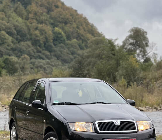 Черный Шкода Фабия, объемом двигателя 1.4 л и пробегом 220 тыс. км за 4450 $, фото 1 на Automoto.ua