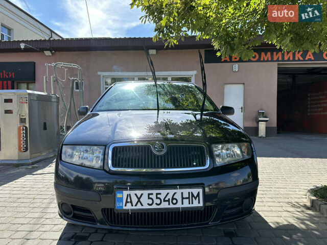 Черный Шкода Фабия, объемом двигателя 1.2 л и пробегом 170 тыс. км за 3700 $, фото 1 на Automoto.ua