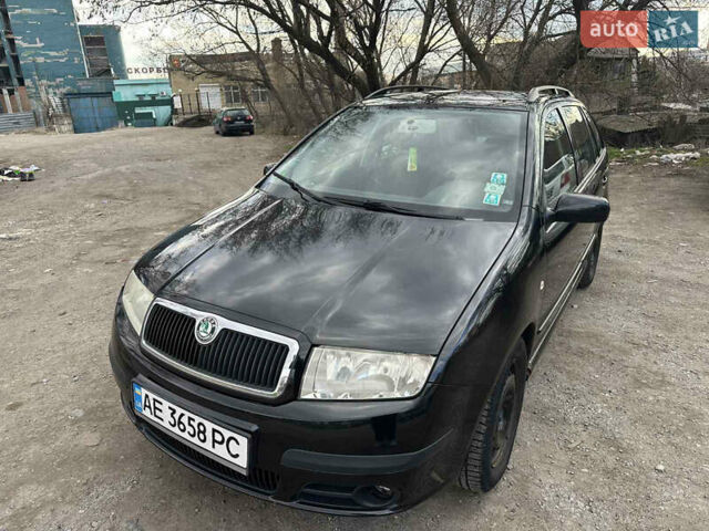 Черный Шкода Фабия, объемом двигателя 1.4 л и пробегом 150 тыс. км за 3700 $, фото 1 на Automoto.ua