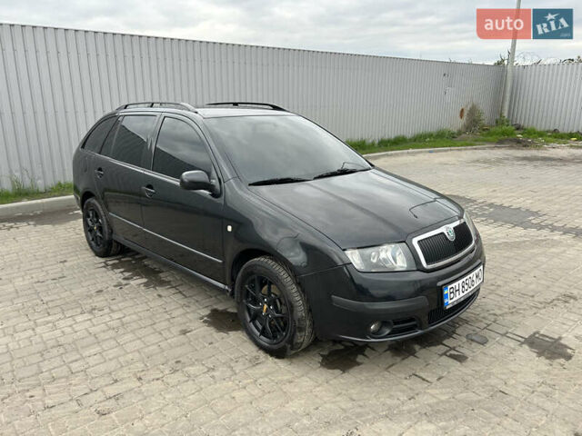 Черный Шкода Фабия, объемом двигателя 1.39 л и пробегом 226 тыс. км за 3900 $, фото 1 на Automoto.ua