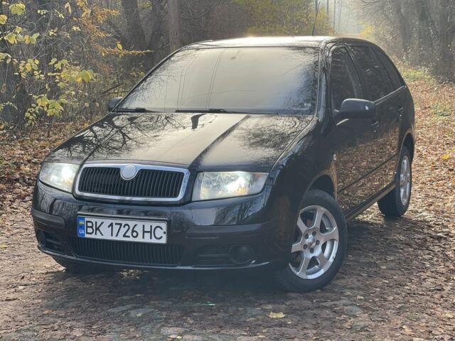 Черный Шкода Фабия, объемом двигателя 1.2 л и пробегом 380 тыс. км за 3100 $, фото 1 на Automoto.ua