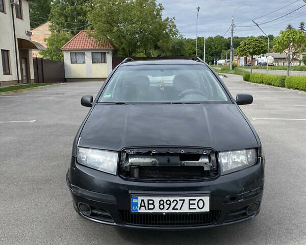 Черный Шкода Фабия, объемом двигателя 1.4 л и пробегом 272 тыс. км за 3900 $, фото 1 на Automoto.ua