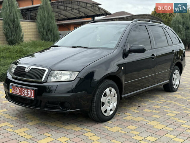 Чорний Шкода Фабія, об'ємом двигуна 1.4 л та пробігом 160 тис. км за 5777 $, фото 1 на Automoto.ua