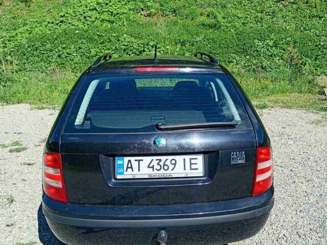 Черный Шкода Фабия, объемом двигателя 1.39 л и пробегом 332 тыс. км за 3700 $, фото 1 на Automoto.ua