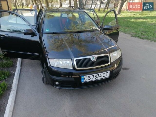 Черный Шкода Фабия, объемом двигателя 1.39 л и пробегом 159 тыс. км за 4800 $, фото 1 на Automoto.ua