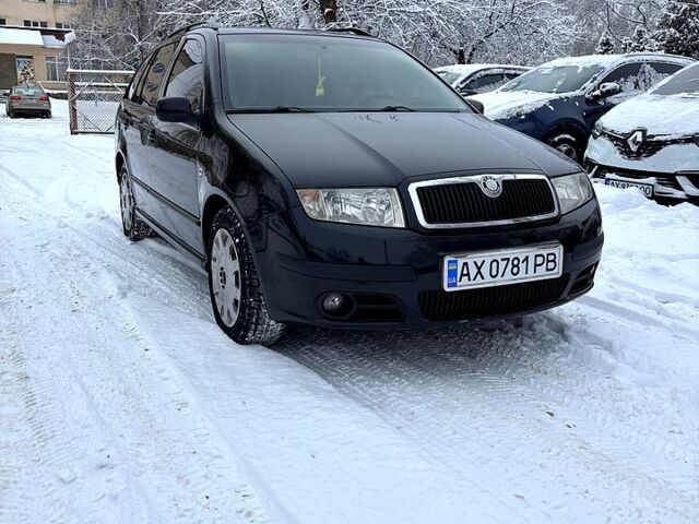 Черный Шкода Фабия, объемом двигателя 1.4 л и пробегом 350 тыс. км за 4100 $, фото 1 на Automoto.ua