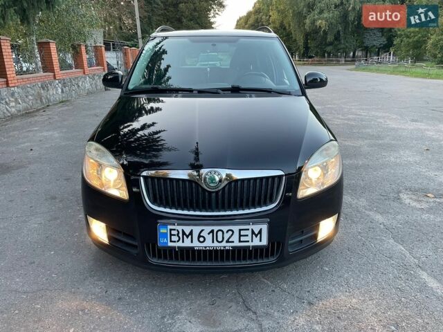 Черный Шкода Фабия, объемом двигателя 1.39 л и пробегом 189 тыс. км за 5400 $, фото 1 на Automoto.ua