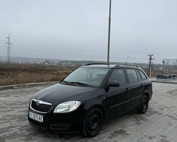 Черный Шкода Фабия, объемом двигателя 1.2 л и пробегом 170 тыс. км за 4650 $, фото 1 на Automoto.ua