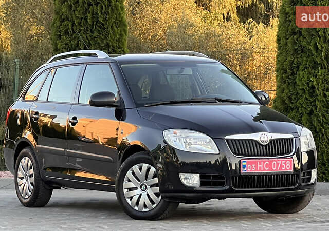 Черный Шкода Фабия, объемом двигателя 1.4 л и пробегом 195 тыс. км за 5850 $, фото 1 на Automoto.ua
