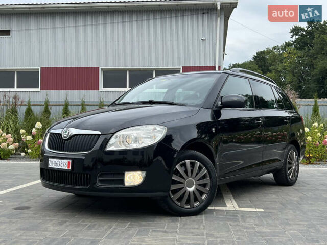 Черный Шкода Фабия, объемом двигателя 1.6 л и пробегом 198 тыс. км за 5850 $, фото 1 на Automoto.ua