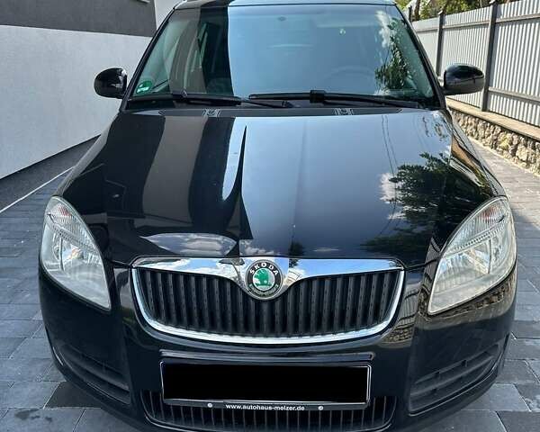 Черный Шкода Фабия, объемом двигателя 1.39 л и пробегом 222 тыс. км за 6000 $, фото 1 на Automoto.ua