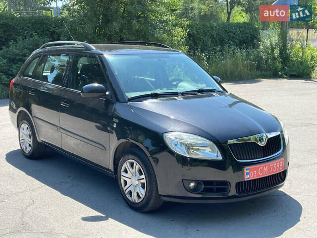 Черный Шкода Фабия, объемом двигателя 1.6 л и пробегом 230 тыс. км за 5499 $, фото 1 на Automoto.ua