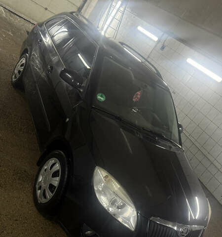 Черный Шкода Фабия, объемом двигателя 1.2 л и пробегом 304 тыс. км за 4300 $, фото 1 на Automoto.ua