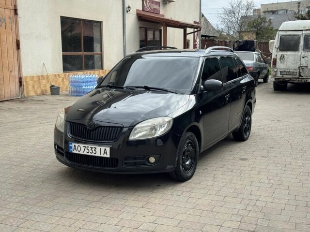 Черный Шкода Фабия, объемом двигателя 1.4 л и пробегом 257 тыс. км за 4599 $, фото 1 на Automoto.ua