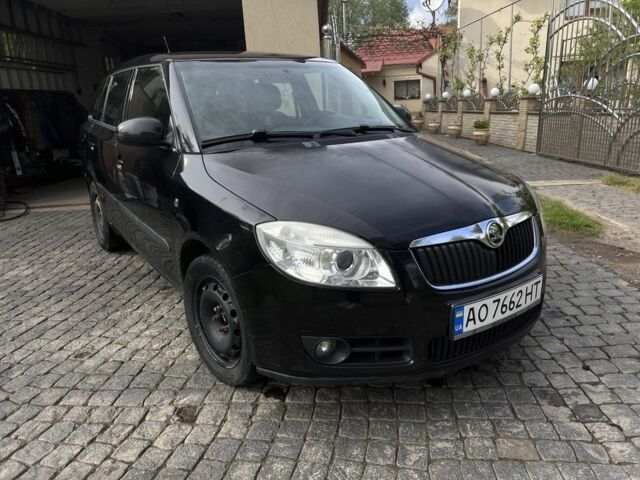 Черный Шкода Фабия, объемом двигателя 1.4 л и пробегом 201 тыс. км за 4600 $, фото 1 на Automoto.ua