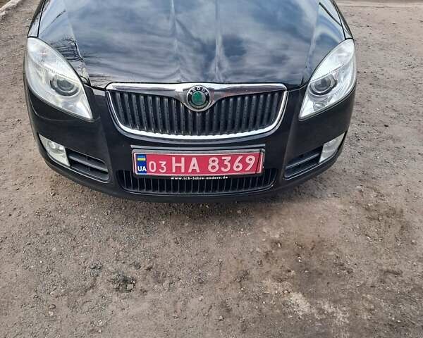 Черный Шкода Фабия, объемом двигателя 1.39 л и пробегом 213 тыс. км за 5600 $, фото 1 на Automoto.ua