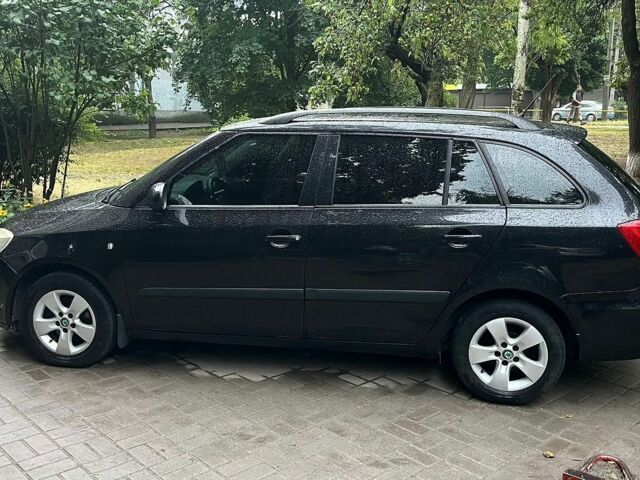 Черный Шкода Фабия, объемом двигателя 1.2 л и пробегом 320 тыс. км за 4700 $, фото 1 на Automoto.ua