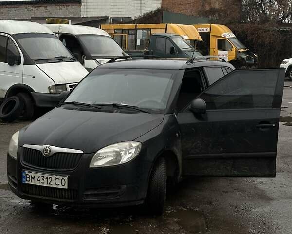 Черный Шкода Фабия, объемом двигателя 1.39 л и пробегом 214 тыс. км за 4700 $, фото 1 на Automoto.ua
