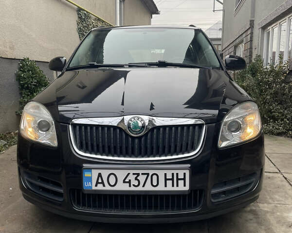 Черный Шкода Фабия, объемом двигателя 1.39 л и пробегом 227 тыс. км за 5100 $, фото 1 на Automoto.ua
