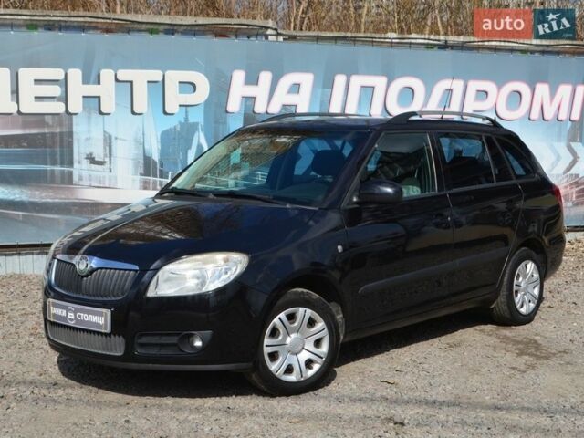 Черный Шкода Фабия, объемом двигателя 1.39 л и пробегом 196 тыс. км за 6000 $, фото 1 на Automoto.ua